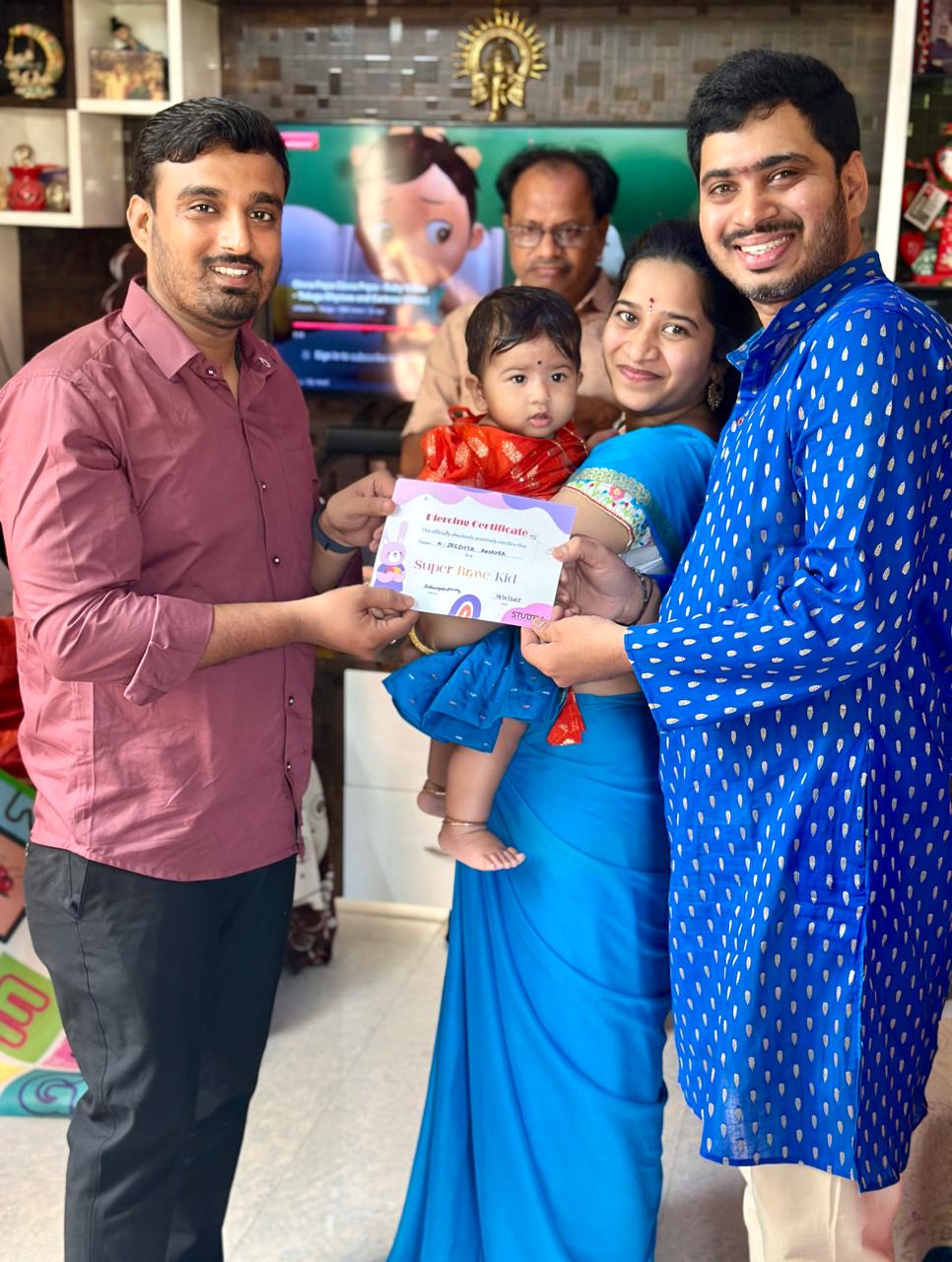Family photo after a gentle at-home ear piercing session